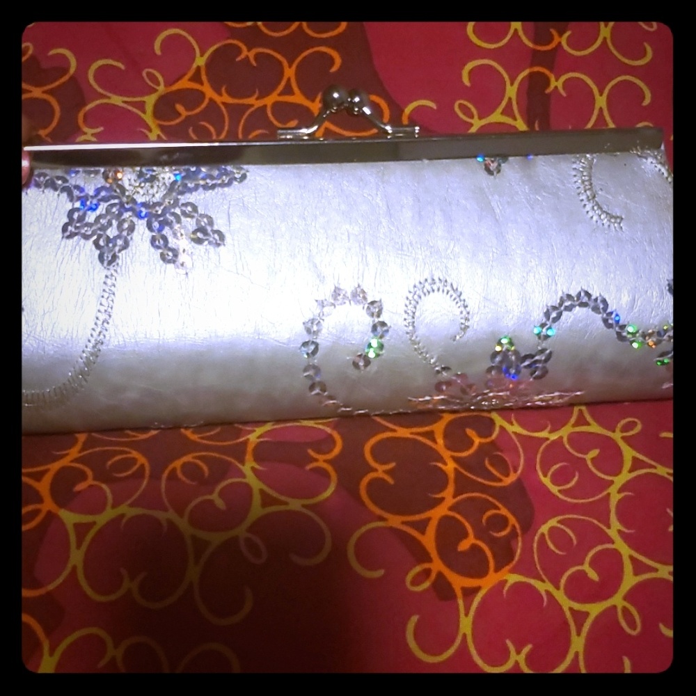 Silver sparkle clutch